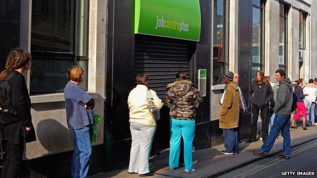 People queuing outside a job centre in Bristol