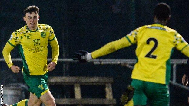 Simon Power (left) celebrates scoring for Norwich Under-23s