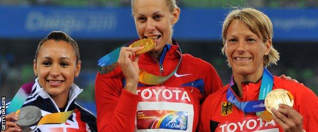 Jessica Ennis-Hill (left) with Tatyana Chernova (centre) at the 2011 World Championships