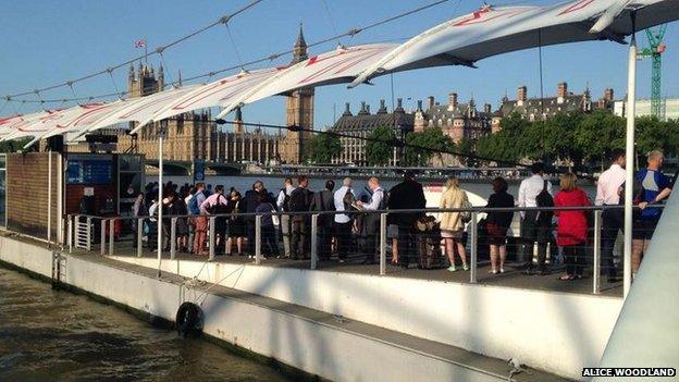 Commuters queuing for river boats