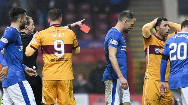 Motherwell striker Scott McDonald (right) is sent off at Fir Park