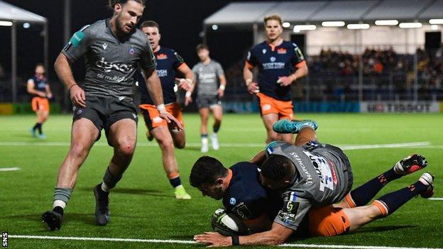 Emiliano Boffelli scores a try for Edinburgh against Bath