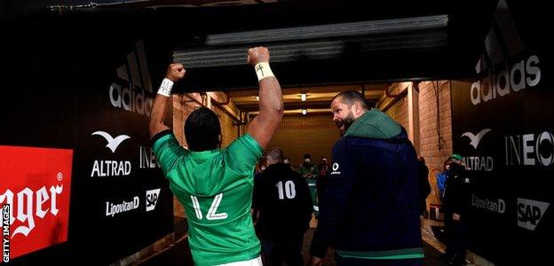 Bundee Aki and Andy Farrell celebrate with fans after beating the All Blacks