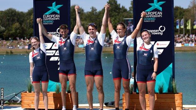 Francesca Allen, Giedre Rakauskaite, Edward Fuller, Oliver Stanhope and Erin Kennedy of Great Britain celebrate after winning the PR3 mixed coxed four final at the European Championships