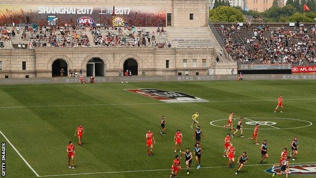 Port Adelaide Power in action against Gold Coast Suns in Shanghai