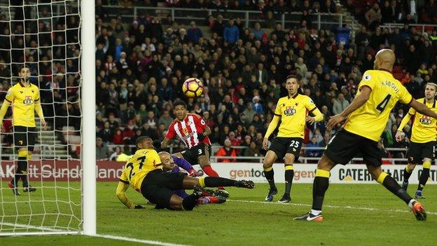 Patrick van Aanholt (left) scores for Sunderland against Watford