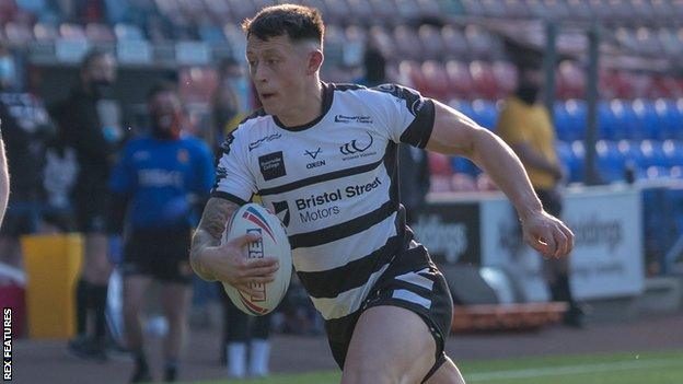 Winger Deon Cross playing for Widnes Vikings