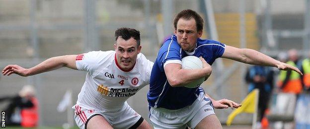 Tyrone defender Cathal McCarron battles with Cavan's Seanie Johnston at Croke Park