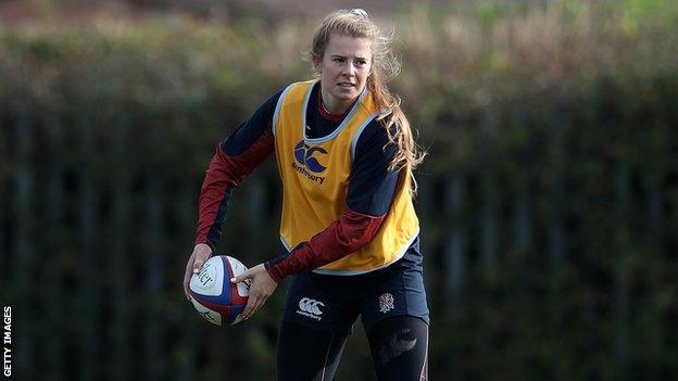 Zoe Harrison passes the ball in training