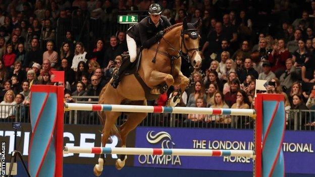 Ben Maher riding Gakhir at the 2019 London International Horse Show.