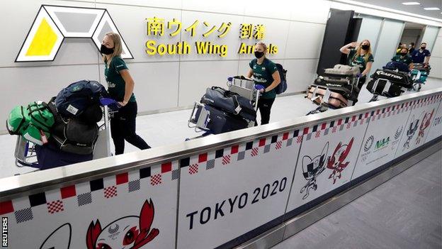 Australia's softball team arriving at the airport in Tokyo