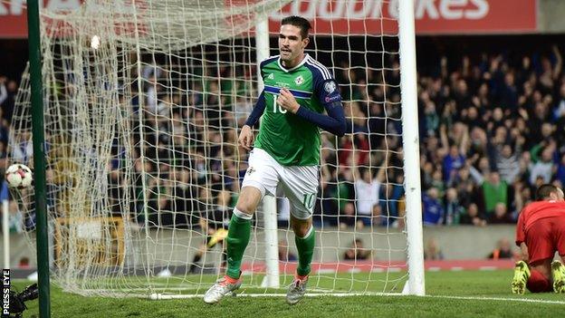 Kyle Lafferty runs away in celebration after scoring Northern Ireland's second goal against San Marino