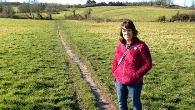 Gill Taylor standing in a field