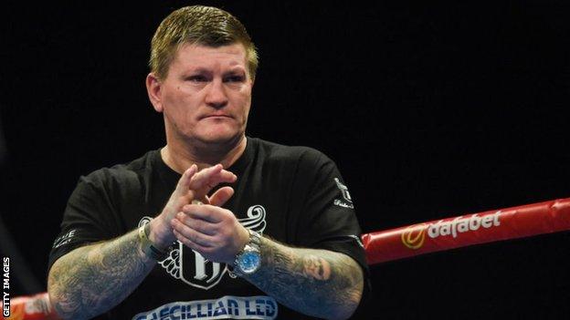 Former world champion Ricky Hatton, now a trainer, applauds his fighter