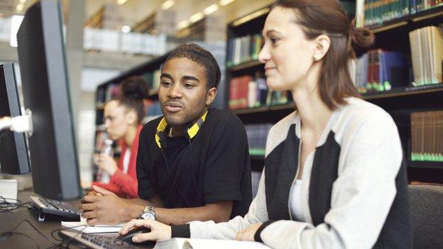 Students using library computers