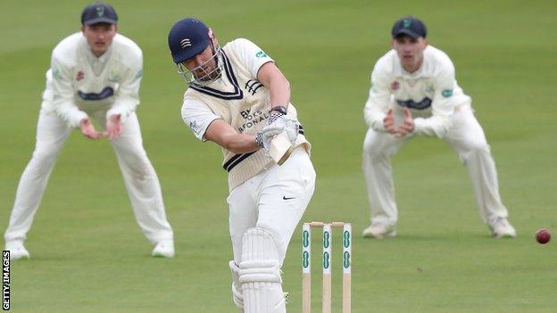 Ollie Rayner pulls a short delivery into the leg-side