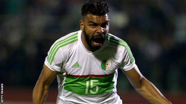 Hillal Soudani celebrates scoring for Algeria