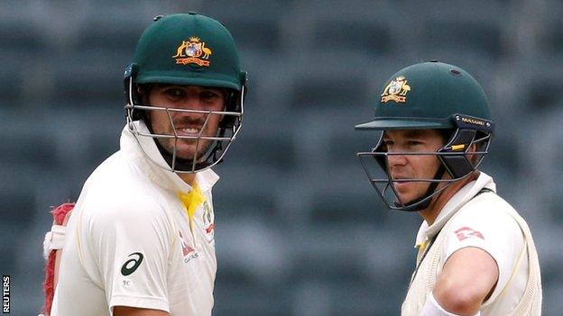 Australia bowler Pat Cummins (left) and captain Tim Paine