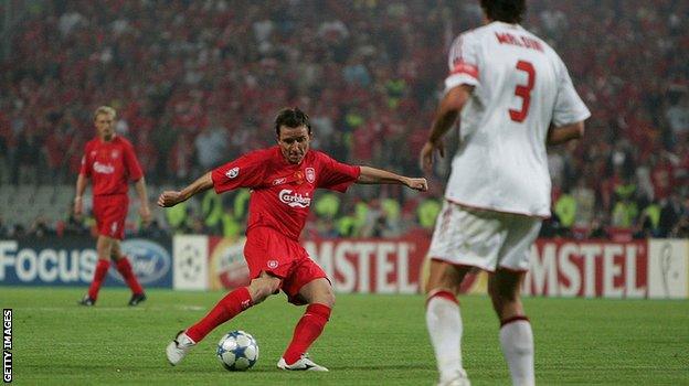 Substitute Vladimir Smicer lets fly home from the edge of the area. Milan keeper Dida gets a hand to his shot but cannot keep it out