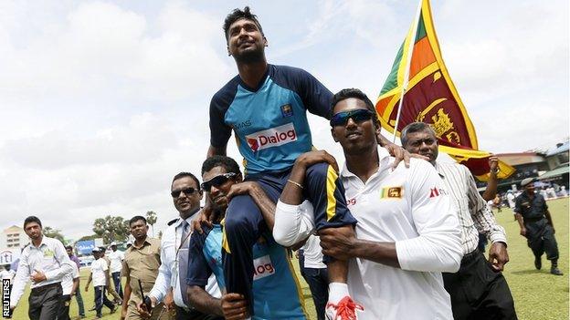 Sri Lanka's Kumar Sangakkara is carried on his team-mates' shoulders after his final Test