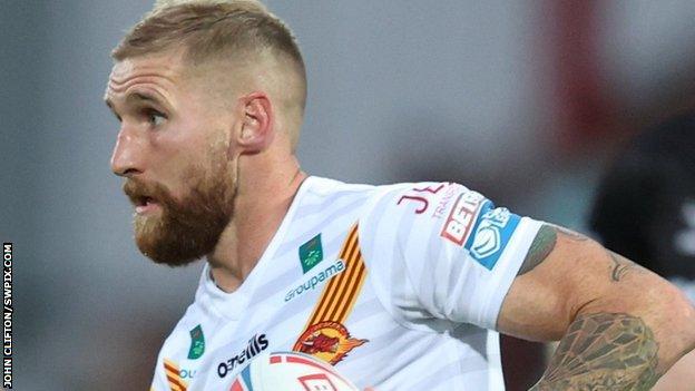 Sam Tomkins' third try in four games for Catalans Dragons closed the door on Hull