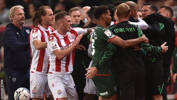 Players and coaches from both sides were part of the late skirmish in Stoke's 1-1 Championship draw with Barnsley earlier in September