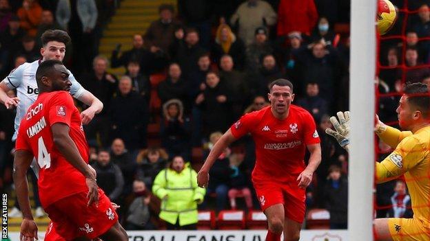 Matt Preston (facing) was Harriers man of the match in the FA Cup fourth round extra-time defeat by West Ham at Aggborough