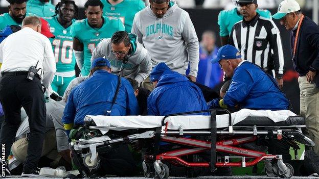 Tua Tagovailoa receives medical attention
