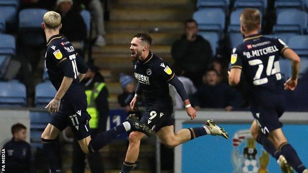 Tom Bradshaw celebrates