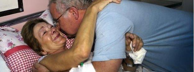 Briton Chris Callaghan (left), 62, who survived the attack, with her husband at a hospital in Sousse