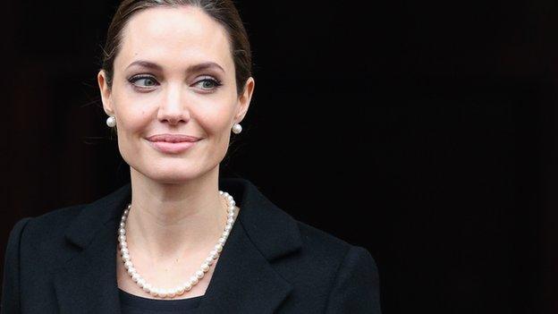 Angelina Jolie - smiling at people