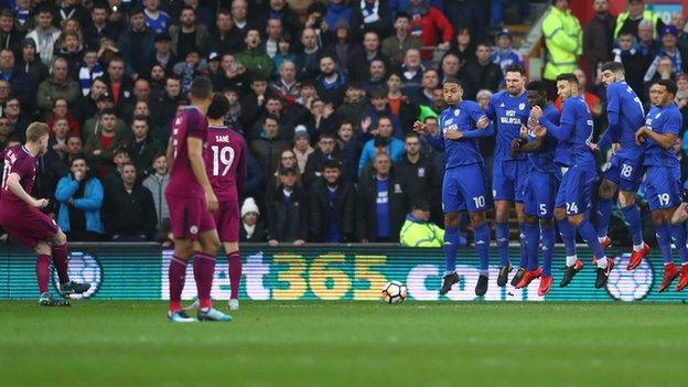 Kevin De Bruyne slid a free-kick under the Cardiff wall for the opening goal