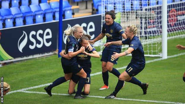 Lizzie Arnot celebrates her late winner against Liverpool