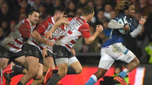 Marland Yarde races away from the Gloucester defence to score a try for Sale Sharks