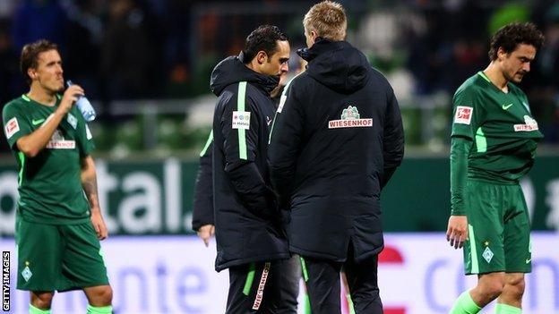 Alex Nouri and Werder Bremen players following a 3-0 defeat to Ausburg