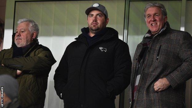 Chris Kirchner (centre) watches Derby County in action