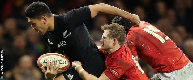 New Zealand's Rieko Ioane powers over against Wales