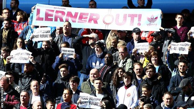 Fans protest against Aston Villa owner Randy Lerner