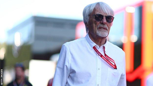 Ex-Formula 1 boss Bernie Ecclestone walks down the paddock at the 2019 Austrian Grand Prix