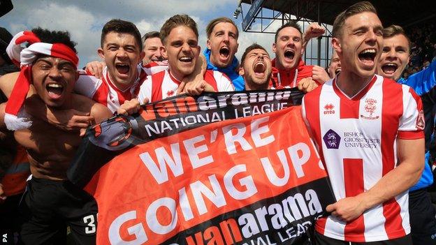 Lincoln City player celebrate promotion