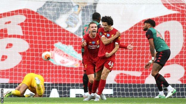 Curtis Jones celebrates scoring for Liveprool against Aston Villa