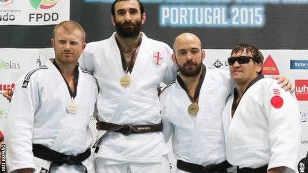 Sam Ingram (second from right) on the podium