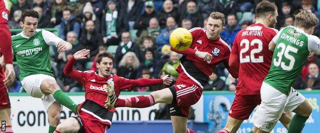 John McGinn scored a delightful goal to send Hibs 1-0 against Ayr United