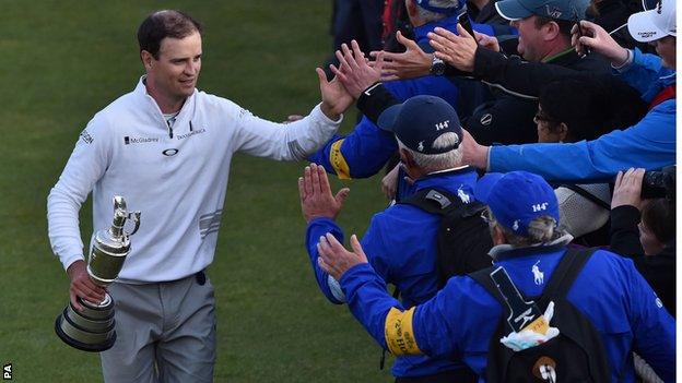 Zach Johnson (left) celebrates