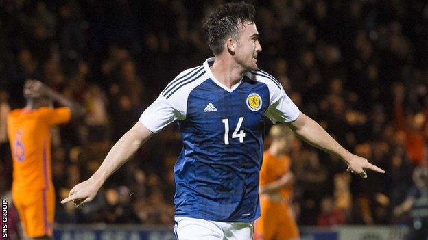 Stevie Mallan celebrates making it 2-0 to Scotland