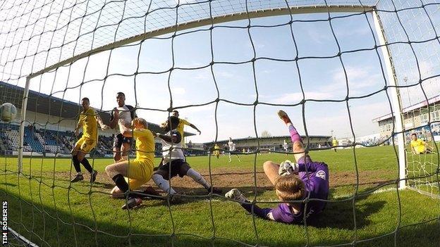 Marcus Dinanga's close-range winner completed Telford's comeback from being 2-0 down with half an hour left to win 3-2 and send Gainsborough down