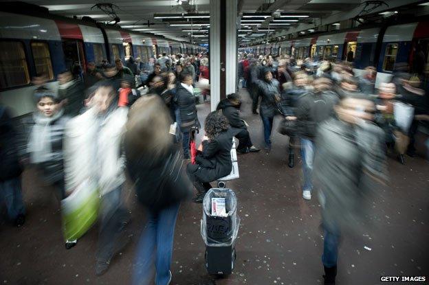 Blurry crowd at a train station