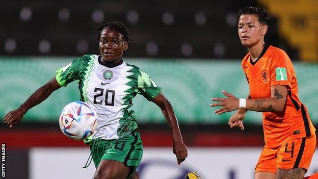 Joy Jerry of Nigeria struggles for the ball against Samantha van Diemen of the Netherlands