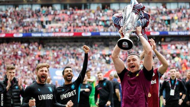 James Chester celebrates Aston Villa's Championship Play-off final win