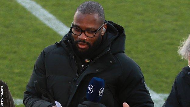 Ugo Monye pitchside with a microphone